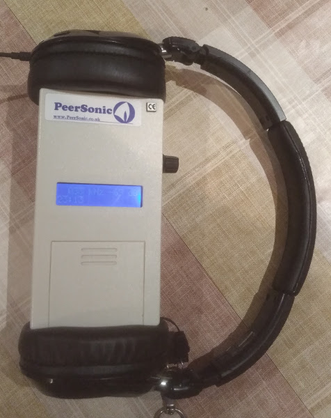 RPA2 detector with headphones mounted over the microphone.